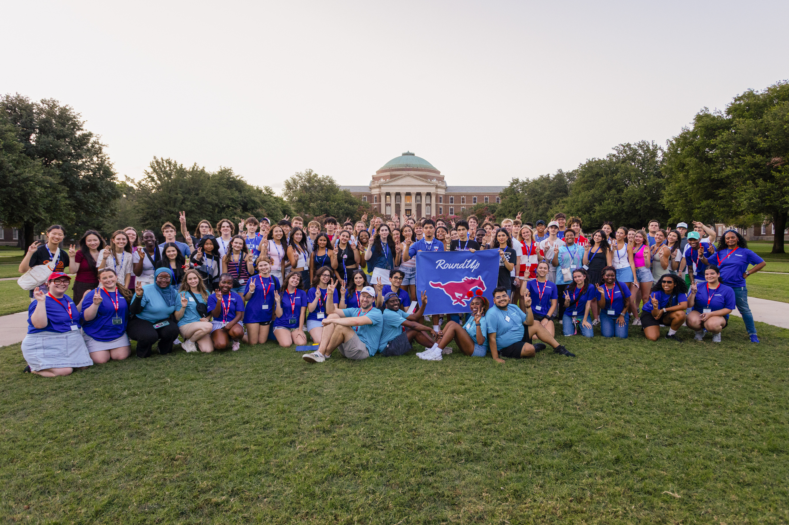 Future students pose after a Campus Scavenger Hunt during the second session of new student orientation for the fall semester.