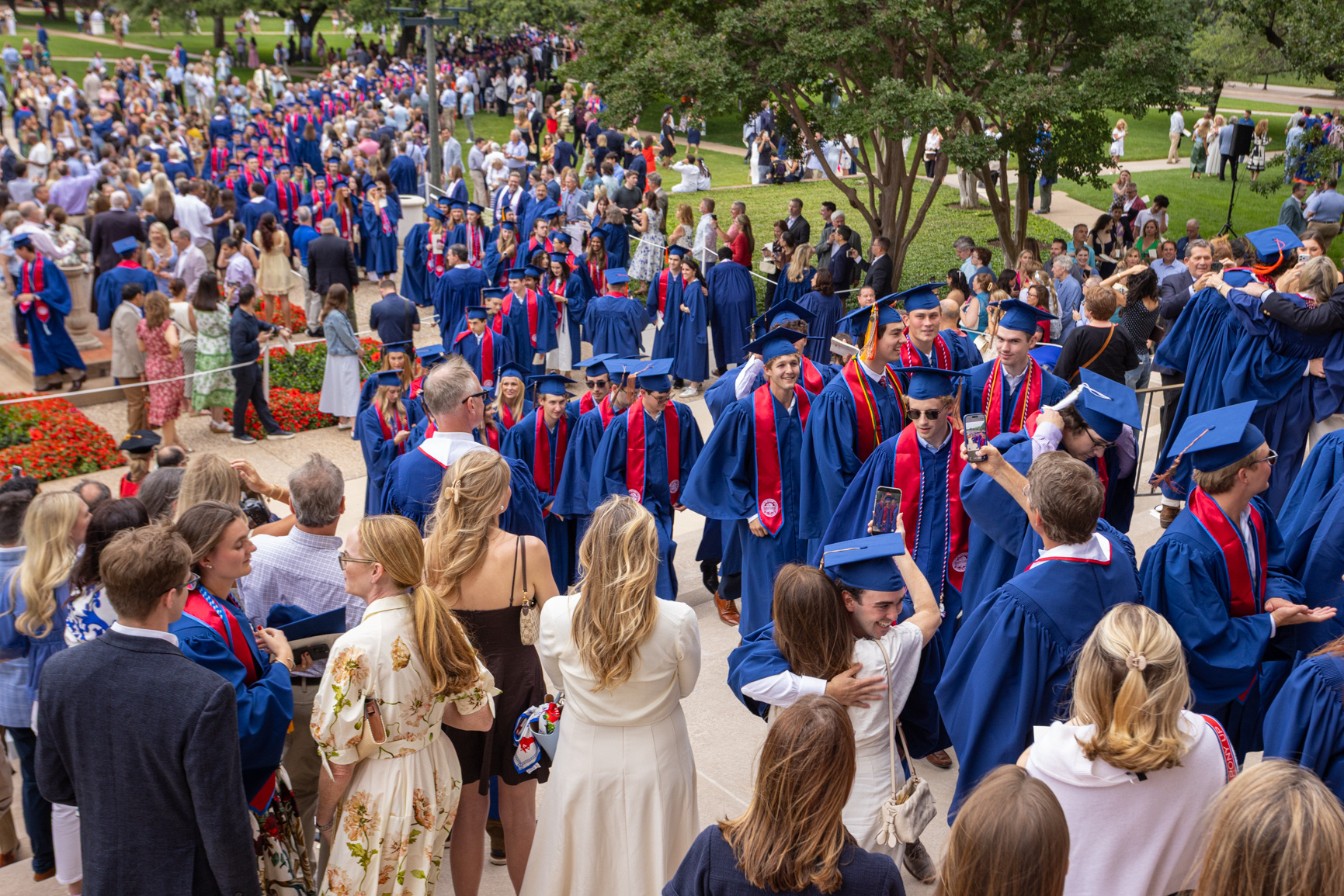 Students proceed to Dallas Hall as part of the ceremonial Baccalaureate and Rotunda Recessional event that marks the symbolic completion of students' baccalaureate degrees.
