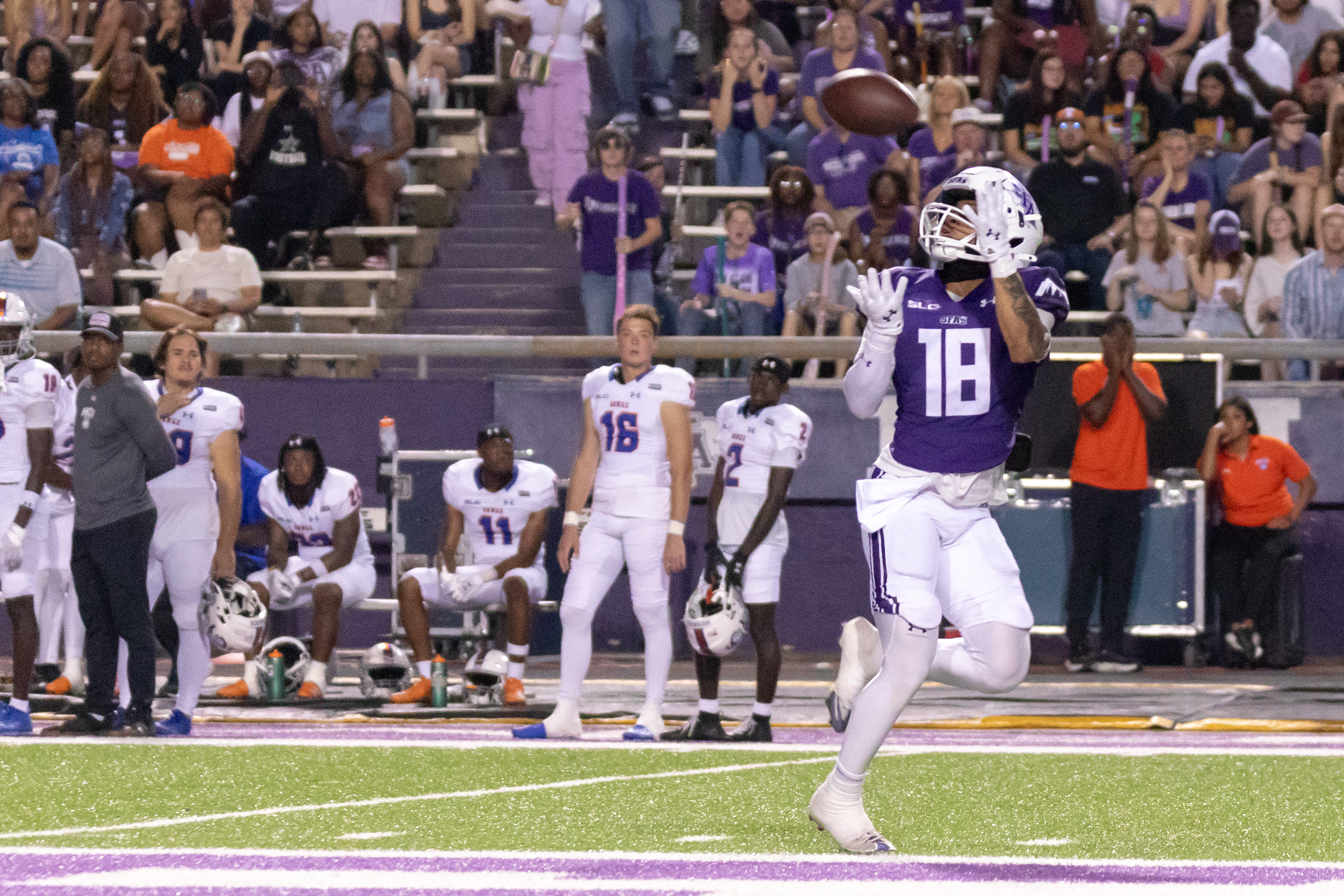 SFA junior wide receiver Jordan Nabors prepares to catch the ball and run for a touchdown. SFA junior quarterback Sam Vidlak threw the ball for 96 yards, the second-longest scoring pass in SFA football history. SFA won against Houston Christian University.